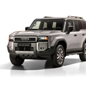 2024 Toyota Land Cruiser front view in metallic silver on white background